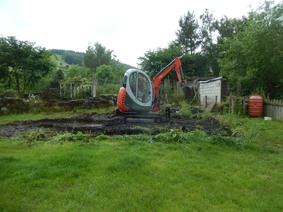 Digging foundations for the new greenhouse