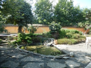 New garden fishpond with hot tub to the left